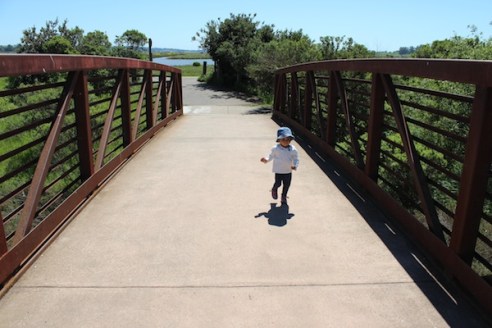 Crossing a small bridge over Adobe Creek.